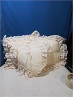 Group of three cream color lace pillows would be