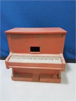 Musical ceramic upright piano working