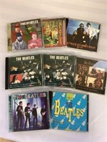 Lot of 8 Beatles CD’s in original cases.