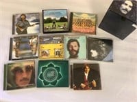 Lot of George Harrison CD’s with cases