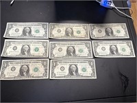 Eight US $1 Bills and One is cut wrong & Five US