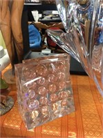Pair of pennies in Lucite bookends