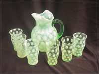 Seven-piece (glows) Fenton green opalescent Coin