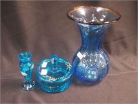 Three pieces of decorated blue glass: powder jar,