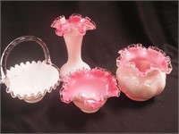 Four pieces of Fenton glass: three are pink