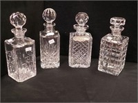 Four crystal square liquor decanters,