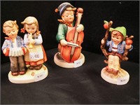 Three Hummel figurines: 5 1/4" Sweet Music;