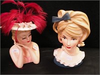 Two head vases: one is 6" with pink hat and