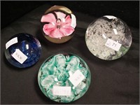 Four crystal paperweights: one