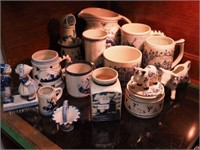 14 pieces of blue Delft: pitcher, vases,