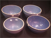 Four vintage stoneware mixing bowls: