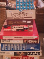 Eight board games: Scrabble, Clue, Monopoly,