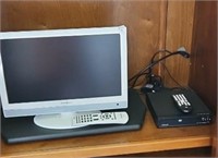 DVD player with monitor, remote and swivel shelf