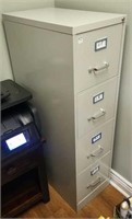 4 drawer metal file cabinet, works good, no key,