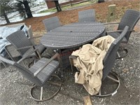 7 pc sunbrella patio table and 6 swivel chairs