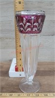 Glass vase with red glass top