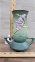 Roseville vase with lillac color flowers
