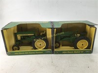 Two John Deere 1/16 Diecast Model Tractors