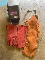 Welding hood, sleeve, and new pair welding gloves