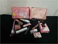 Two Ipsy bags with makeup