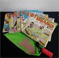 vintage comic books and doggie doo bag with
