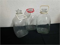 three vintage  1 gallon jugs
