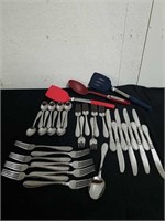 Nearly complete set of silverware, and kitchen