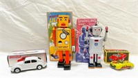 3 tin toys and Vw car, Sparkling Mike, Robot