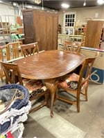 Vintage oval dining room table with four chairs
