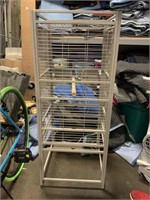 Metal bird cage with a Wooden perch