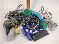 Assorted gaming controllers, cables, etc