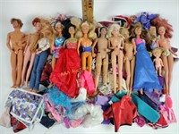 Assorted Barbies &  Barbie clothes