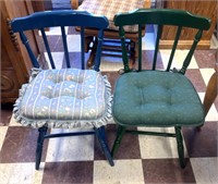 Two wooden painted chairs with cushions
