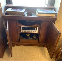 Magnavox stereo-cabinet w/record player and record