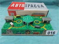 Vintage Soviet era tin wind up gas station toy,