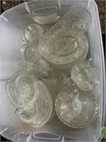 tote of clear glassware