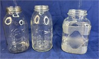 Clear glass jars, many