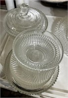 Clear glass covered dish and plates