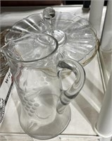 Glass pitcher and trays