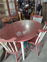 Table With 3 Matching and 1 Odd Chair