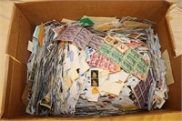 Box of 1,000 US Stamps on and off paper