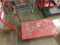 Red rolling flat cart. 42x24