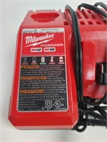 1.  Milwaukee M12. - M18 battery charger ( new )