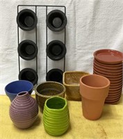 Stack of clay flower pot bottoms, 6 Misc