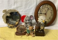 Miscellaneous figurines a clock and a milk crate