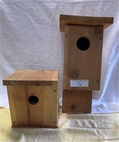2 wooden birdhouses