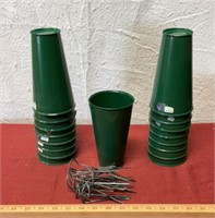 17 tin pots with ground stakes