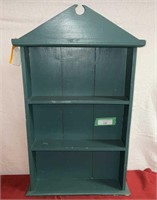 Teal colored wooden hanging shelf unit 19“ x 31“