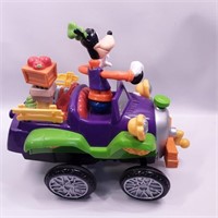 Goofy in car