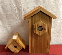 2 wooden bird, houses, one smaller, one and one
